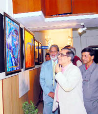 Dr Girijesh Pant, VC, Doon University, at the inauguration of a painting exhibition by Chandra B Rasaily at Uttaranchal Grameen Bank Art Gallery in Dehradun on Monday