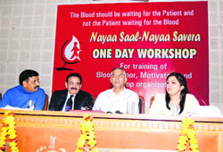 Yudhvir Singh Khyalia (second from right) and Ved Beniwal (second from left) at a workshop on blood donation in Sirsa on Sunday.