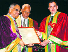 Governor NN Vohra and Chief Minister Omar Abdullah present Doctor of Science (honoris causa) to NR Narayana Murthy, non-executive chairman of Infosys Technologies, at the second convocation of Shri Mata Vaishno Devi University in Katra on Monday