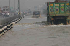 A road is waterlogged after Monday nights rainfall in Gurgaon.