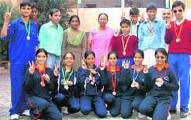 The visually challenged students of Vocational Rehabilitation Training Centre for Blind and Disabled, Ludhiana, who won medals in the First North India Music, Education and Sports Meet for the Blind at Faridkot recently.