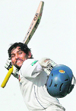Sri Lankas Tillekeratne Dilshan celebrates after completing his century in Ahmedabad 