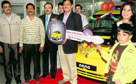 The four winners from Punjab, Satpal Chaudhary, Gurcharan Singh, Pankaj Jain and Manoj Magoo, receive keys of Nano cars won by them in a contest organised by Godrej Consumer Products Limited (GCPL). The keys were presented to them by the GCPL managing director, Dalip Sehgal, in Chandigarh on Wednesday