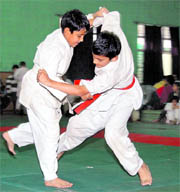 A match in progress at the District Judo Championship in Dehradun on Wednesday