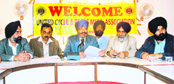 Members of the United Cycle and Parts Manufacturers Association at a press conference in Ludhiana