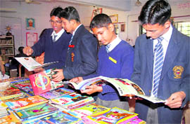 Students browse through books at an exhibition at Kendriya Vidyalaya, IIP, Dehradun, on Thursday.