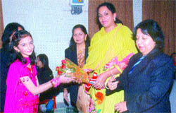 Punyaa Dewan, head girl of Apeejay School, welcomes Ravneet Brar, wife of Jagbir Singh Brar (MLA), at the schools annual function in Jalandhar.