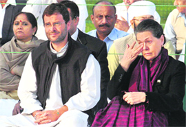 Congress president Sonia Gandhi and her son Rahul at a function held to pay tributes to former PM Indira Gandhi on her 92nd birth anniversary at Shanti Sthal, New Delhi, on Thursday.