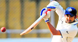 Gambhir hits a shot on the fourth day at the Motera stadium in Ahmedabad on Thursday.