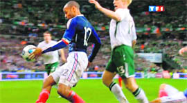 A TV grab shows Henry (L) eyeing the ball on Wednesday. 