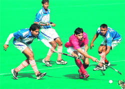 Players in action during a match at the Hockey Stadium, Sector 42, Chandigarh, on Friday.