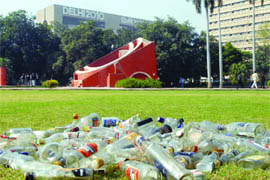 A day after sugarcane farmers rally, wine bottles are found at the Jantar Mantar, New Delhi on Friday.