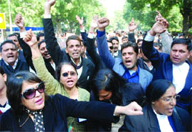 Advocates from Uttar Pradesh and Delhi march to Parliament in New Delhi on Friday. They were shouting slogans, demanding a High Court Bench in western Uttar Pradesh.