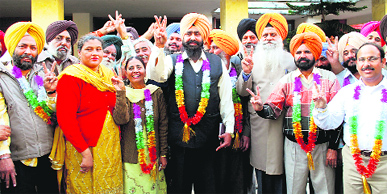 Members of the PAU Employees United Front celebrate their victory at Ludhiana on Friday.