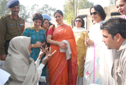 Mamta Surinder Nath, president, Chetak AWWA, listening to Bachan Kaur, a war widow, during the Veer Naari meet held at Bathinda cantonment