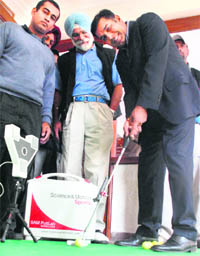 Leading Asian Tour golf professional Harmeet Kahlon putts under the eyes of the SAM PuttLab at the Chandigarh Golf Club on Saturday.