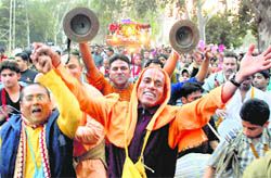 Devotees take part in the ISKCON rath yatra in Chandigarh on Saturday.