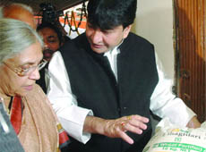 Chief Minister Sheila Dikshit with Delhi food supplies minister Haroon Yusuf launches fortified flour at a Kendriya Bhandar centre in New Delhi on Saturday.