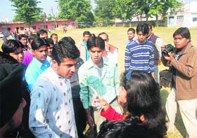 Students argue with one another at SMJN College in Haridwar