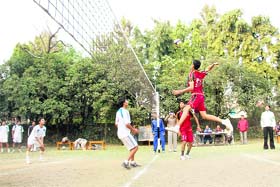 A player jumps to smash the ball at the Council School Boys Volleyball Tournament