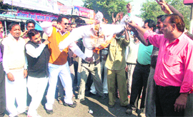 Hindu Jagran Manch activists burn an effigy in Haridwar on Saturday.