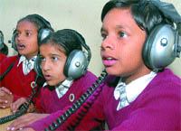Students use a group hearing aid, provided only in one room, which can be used only by 11 students at a time