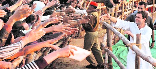 Congress general secretary and Amethi MP Rahul Gandhi meets supporters during an election rally in Ranchi, Jharkhand, on Saturday.