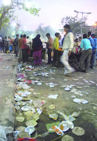 The litter lying outside the IITF-2009 venue in New Delhi on Sunday.