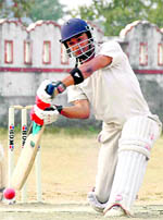 A match in progress at the Santosh Agarwal Memorial Cricket Tournament in Dehradun on Sunday