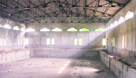 The incomplete all-weather swimming pool.