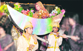 A doli in the shape of moon