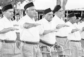 Karnataka Chief Minister BS Yeddyurappa (second from left) participates in the RSS convention in Bangalore on Sunday.