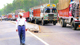 A view of trucks lined up near the Shambhu sales tax barrier at Rajpura.