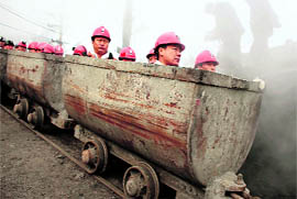 Rescuers prepare to enter the Xinxing coal mine to search for survivors following a gas explosion at the mine in Hegang, Heilongjiang Province