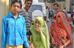 An octogenarian being helped by her grandson during polling in Rajasthan 