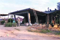 The illegal structure being raised at the venue of the marriage reception of Bikram Singh Majithia at Seonk village, which has caught the attention of GMADA.