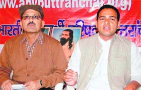 Uttarakhand state president, ABVP, Umed Singh Negi and state secretary Brijesh Bankoti hold a press conference in Dehradun