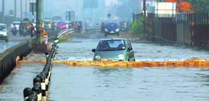 This stretch of a service road adjoining NH-8 near Hero Honda chowk in Gurgaon remains waterlogged most of the time, creating problems for motorists.
