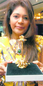Bina Goenka shows one of her piece