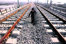A labourer works at the construction of Wuhan Railway Station in Wuhan, Hubei province, on Tuesday. China plans to add around 20,000 km of new railway track in the west of the country by 2020, the official Xinhua agency quoted a senior official saying on Monday, without giving a price for the expansion.
