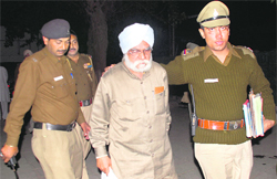 Gurbachan Singh, owner of Victoria Palace, in police custody in Chandigarh