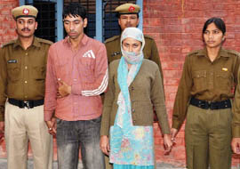 Sandeep and Saloni, who had allegedly kidnapped a child, in police custody at Sector-10 in Gurgaon on Tuesday.