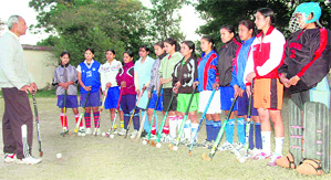 A camp for the girls hockey team of HNB Garhwal University under way at MKP PG Girls College in Dehradun. Tribune photo: Vinod Pundir