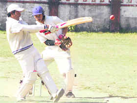 A player hits a shot at the Shayam Datt Joshi Memorial Cricket Tournament in Dehradun on Tuesday.