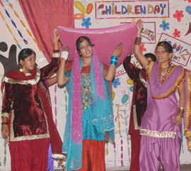 DAV College students give a performance.