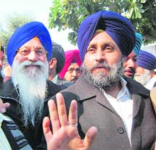 Deputy CM Sukhbir Singh Badal and SGPC chief Avtar Singh (left) go to attend a meeting of the SGPC in Amritsar on Tuesday.