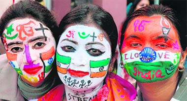 Students of Dev Samaj College for Women celebrate the National Communal Harmony Day at Sector 45 in Chandigarh on Wednesday.