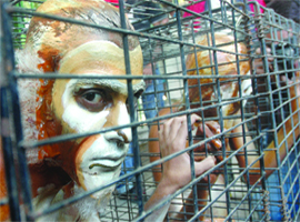 PETA activists protest against animals used by the All-India Institute of Medical Sciences for research in New Delhi