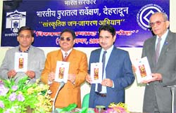 Officials of the ASI release a souvenir on the concluding day of World Heritage Week in Dehradun on Wednesday. 