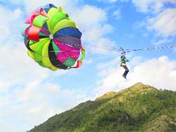 A parasailing enthusiast takes a flight in Sour valley of Pitthoragarh.